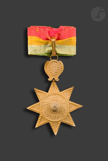 null ETHIOPIA 
ORDER STAR 
Commander's star in gilt bronze, with forward-curved branches....