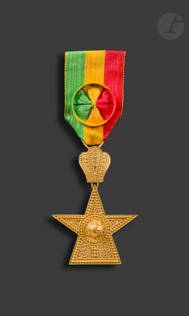 null ETHIOPIA 
ORDER OF STAR 
Officer's Star in gilt bronze. Rosette ribbon. 
74...