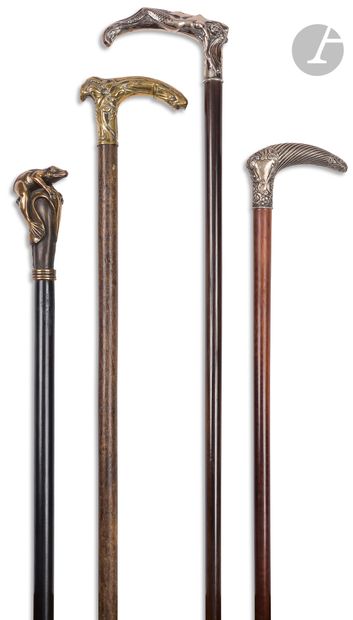 null Set of four canes complete with their ferrules, circa 1900, including two with...