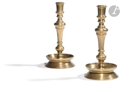 
Pair of brass candleholders, moulded circular...