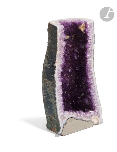 Beautiful amethyst half geode with traces...