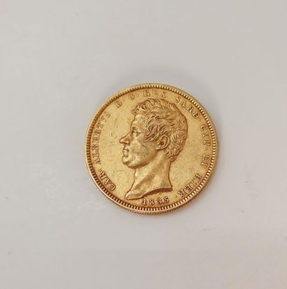 null 
1 pièce de 100 Lire en or. Type Charles Albert. 1835, dans son sachet numéroté...