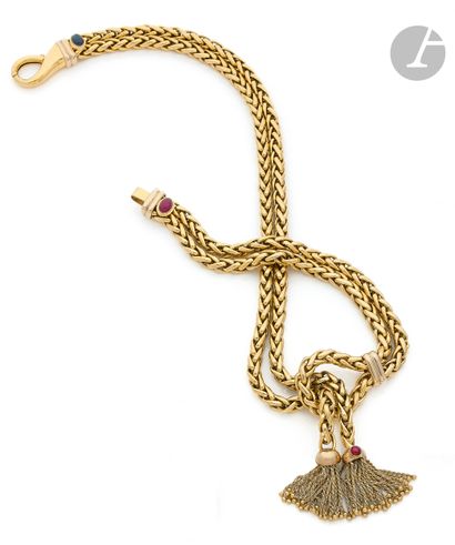 null Palm tree link necklace in 18K (750 ‰) gold, embellished with gold tassels,...