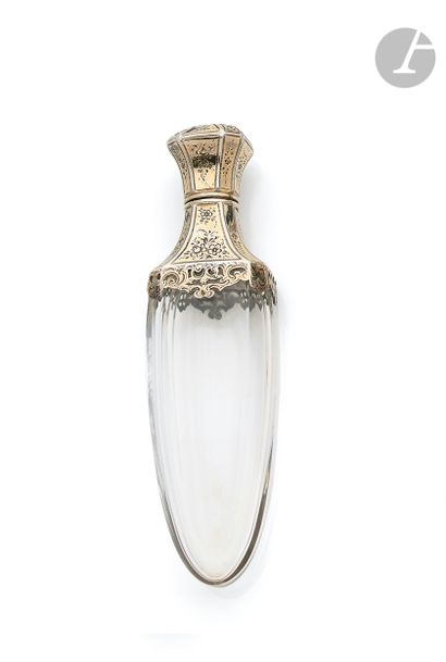 null Salt bottle in faceted crystal mounted in silver, the crystal stopper. French...