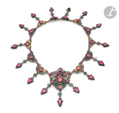 null Silver necklace, articulated with filigree motifs set with pink and green glass...