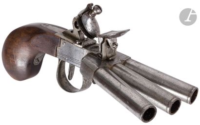 null Flintlock box pistol with "duck foot" system, three shots.

Separate round barrels,...