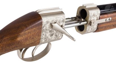 null Baby Bretton" shotgun, deluxe model, two shots, 12-70 caliber.

Separate, superimposed...