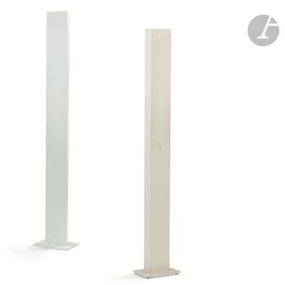 null MODERN WORK 
Two floor lamps; one in white lacquered sheet metal, the other...