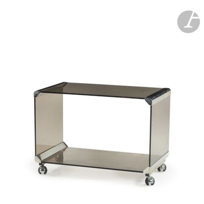  MERONI & RADICE Television table on wheels. In glass and metal. Scratches from use....