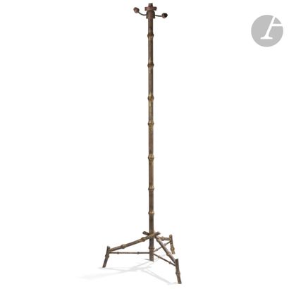  WORK OF THE 1940s-50sBamboo Tripod floor lamp. The shaft and the legs in gilded...