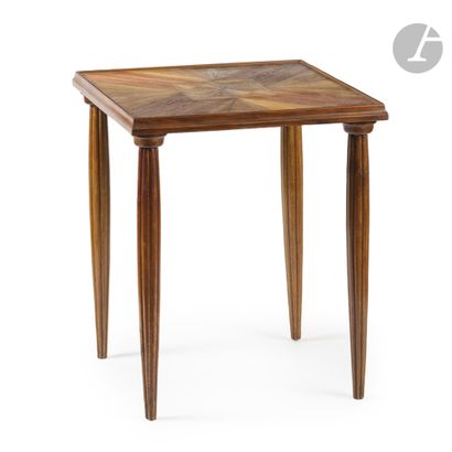 null DECORATIVE ART WORKSun
and square
side
table.
The tapered and gadrooned legs...