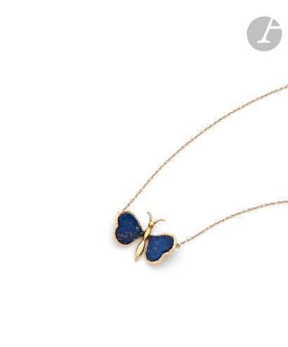 null Necklace in 18K (750) gold, decorated with a butterfly with lapis lazuli wings....
