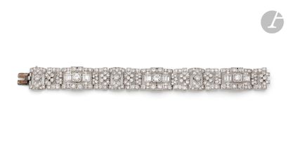 null Platinum bracelet, articulated with links pierced with geometrical motifs set...