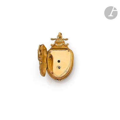 null ANONYME. Vers 1870

Montre pendentif en forme de scarabée en or 18K (750), les...