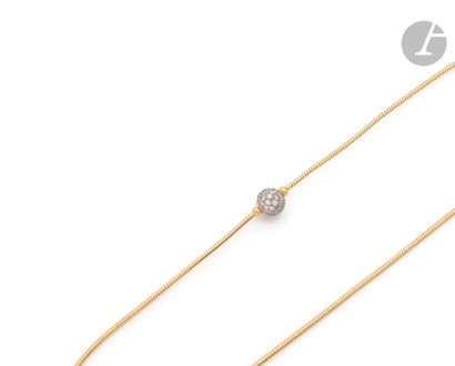 null TIFFANY & Co

18K (750) gold cable necklace, featuring a platinum sphere paved...