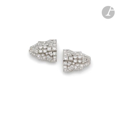 null Pair of platinum lapel clips with geometric designs set with round old cut and...