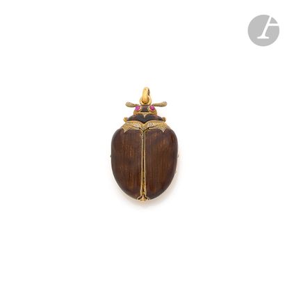 null ANONYME. Vers 1870

Montre pendentif en forme de scarabée en or 18K (750), les...