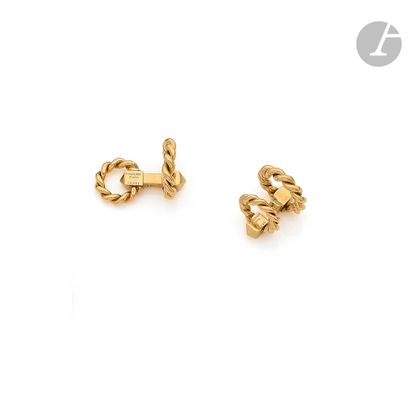  BOUCHERON 
Pair of 18K (750) gold cufflinks. Signed and numbered. Weight : 21,1...