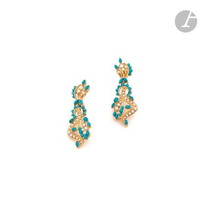 Pair of 18K (750) gold earrings set with...