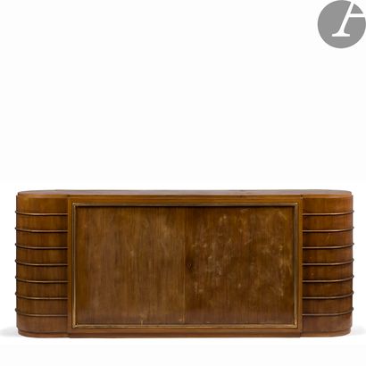 null 
JEAN PASCAUD (1903-1996)

Rosewood veneered sideboard with rounded ends and...