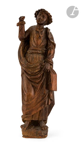  Saint John of Calvary in carved walnut; monoxyl base. 16th century. H : 87 cm (wormholes,...