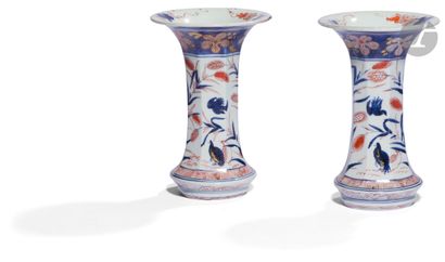 null Japan
A pair of horn-shaped vases with blue, red and gold Imari decoration of...