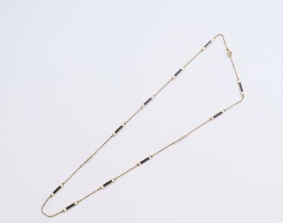 null Necklace in 18K gold (750) punctuated with rectangular enamelled motifs. Length...