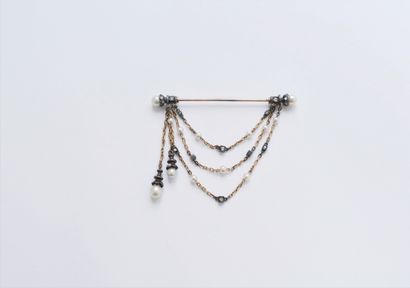  18K (750) gold and silver brooch set with rose-cut diamonds and small pearls. Work...