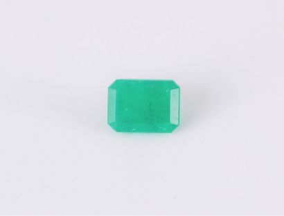 Rectangular emerald on paper weighing 1.90...