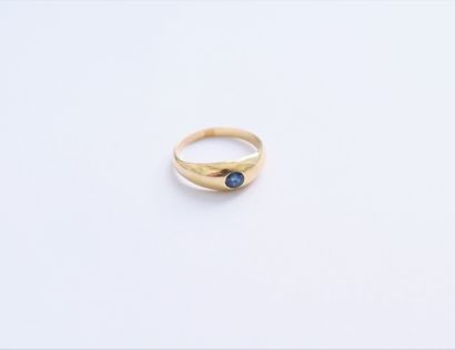 18K (750) gold ring, set with a sapphire....