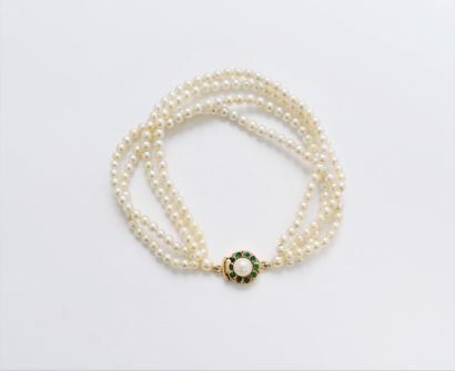 null Bracelet of 4 rows of small cultured pearls, clasp in 18K gold (750) set with...