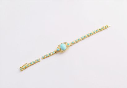 null Bracelet en or 18K (750), serti de turquoises cabochons. Longueur : 17 cm environ....