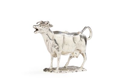 null BIRMINGHAM 19th
CENTURYSilvered metal
hopper
showing a cow on a flowered terrace.
Metal...