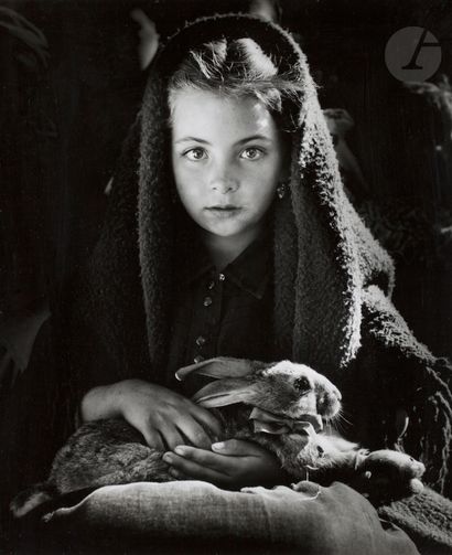 null Jean Dieuzaide (1921 - 2003) 
Little girl with a rabbit. Nazaré, 1954. 
Silver...