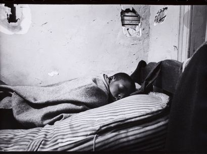 null Gordon Parks (1912 - 2006) 
Norman Jr. Sleeping Fontanelle, Harlem, New York,...