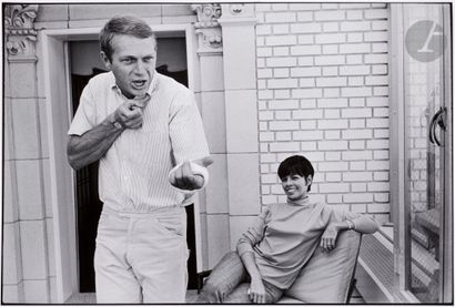 null William Claxton (1927 - 2008) 
Steve McQueen and Neile Adams on a veranda, 1964....