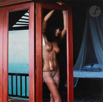 null Guido Argentini (1966) 
Olesya playing with a window in Ko Samui, 2007. 
Chromogenic...