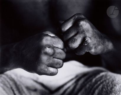 null Gordon Parks (1912 - 2006) 
The Fists of Muhammad Ali. London, 1966. 
Silver...