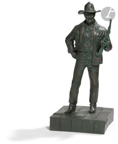 John Wayne en pied, armé de sa célèbre Winchester
Figurine...