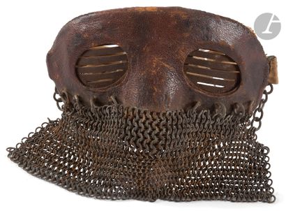 Shrapnel mask for tanker. 
Covered with brown...