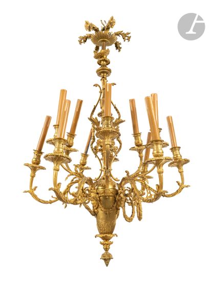 null Gilt bronze chandelier with twelve scrolled lights with garlands, the shaft...
