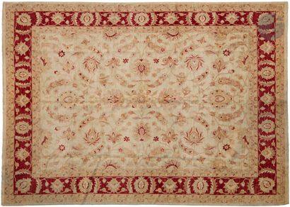 null Carpet with ivory background and large flower motif, wide orange border with...