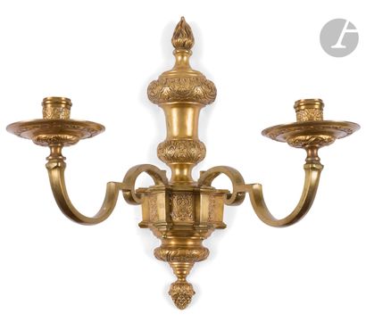 null Suite of five ormolu sconces, with two arms of light and stylized foliage decoration.
End...
