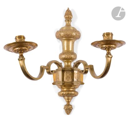 null Suite of five ormolu sconces, with two arms of light and stylized foliage decoration.
End...