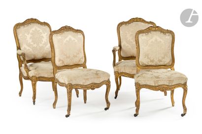 null A suite of two giltwood armchairs, two chairs and a sofa, with flat backs and...