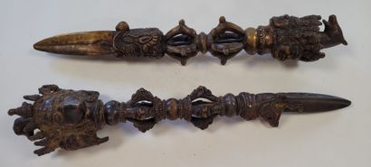 null Two bronze ritual daggers or phurbu, Tibet, 20th
centuryTripartite
blades
emerging...