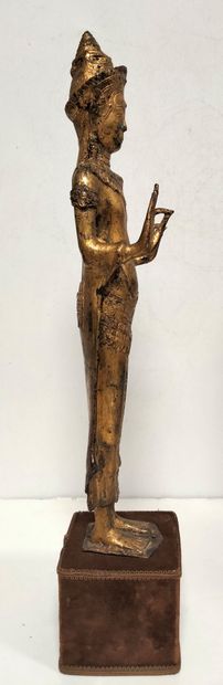 null Statue of Buddha, Thailand Standing
in abhaya mudra of protection. Gilded bronze,...