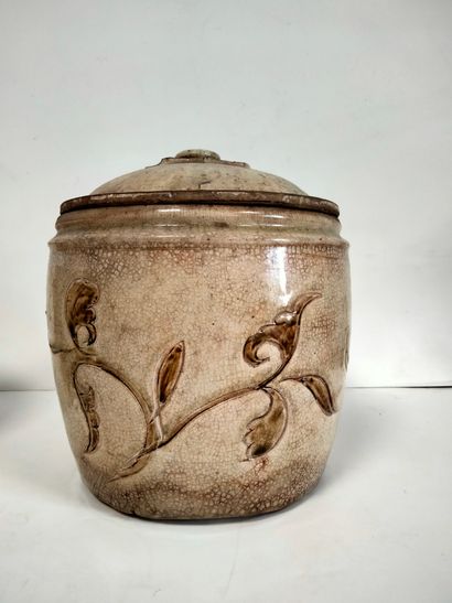 null Two jars, one covered in beige stoneware, one with incised foliage decoration,...