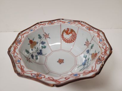 null A porcelain bowl of decagonal form with Kakiemon decoration of horses, Japan,...