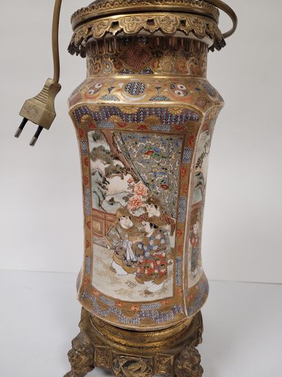 null Satsuma scroll vase, Japan, 19th
centuryDecorated with four scenes in rectangular...